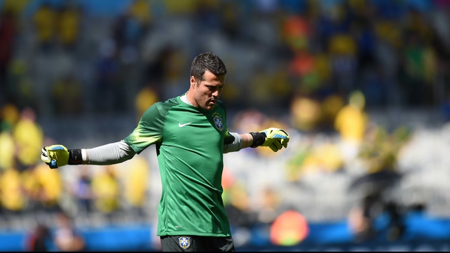 Brazil goalkeeper Julio Cesar warmed up prior to the opening whistle...
