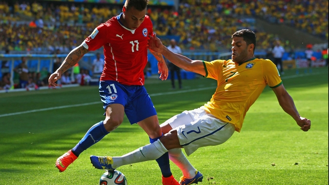 Chile forward Eduardo Vargas pushed ahead to force his side's hand with a bit of urgency, battling against Hulk along the way