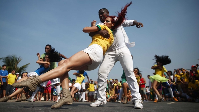 A crowd of spectators at the Copacabana in Rio couldn't help but dance throughout it all
