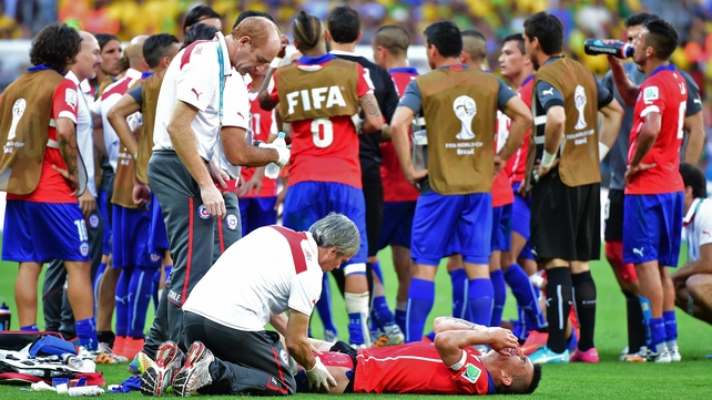 Before play resumed, Medel - who seemed in a great deal of pain - received some medical attention on the sidelines
