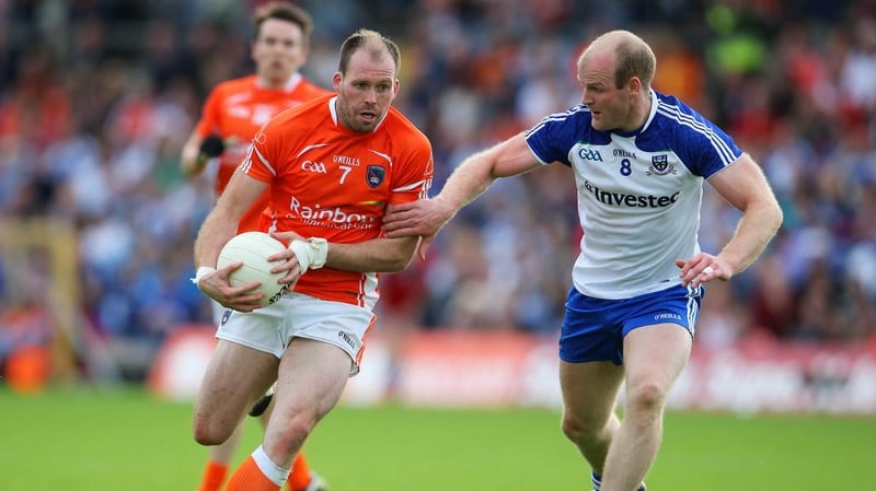 Dick Clerkin of Monaghan tackles Armagh's Ciaran McKeever