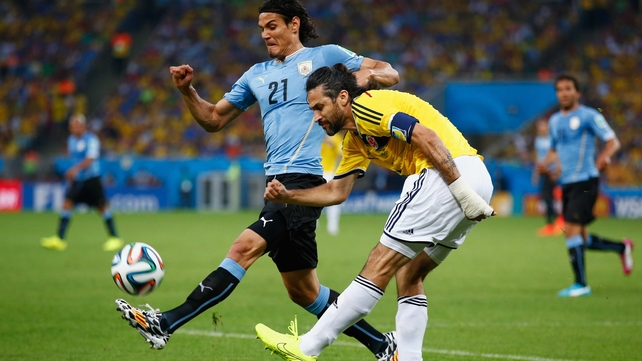 Both sides came out playing ferociously and emotionally. Here, Uruguay forward Edinson Cavani controls the ball against Colombia defender and captain Mario Yepes