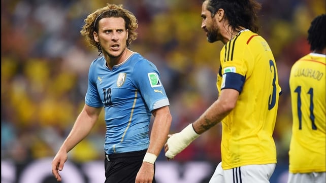 Forlan and Yepes continued to have it out on the pitch