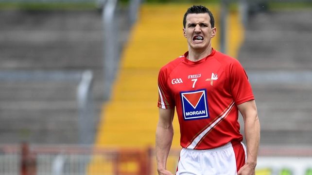 ... but Louth's Adrian Reid was unimpressed after he missed a shot on goal