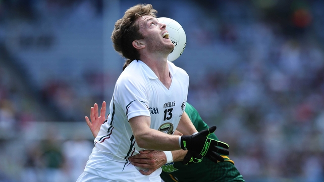 Niall Kelly of Kildare and Donal Keegan Meath lose sight of the ball for a moment