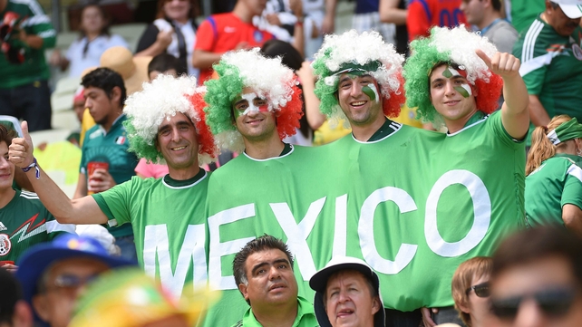 These afro'ed Mexico fans banded together to watch the action
