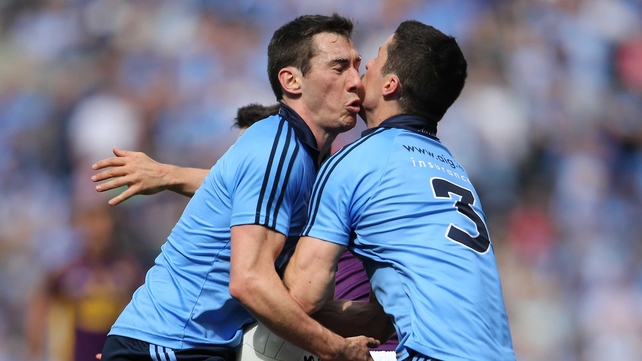 Ouch: Dublin's Nicky Devereux and Rory O'Carroll clash heads while contesting a ball