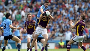 Michael Darragh Macauley climbs high to challenge Daithi Waters