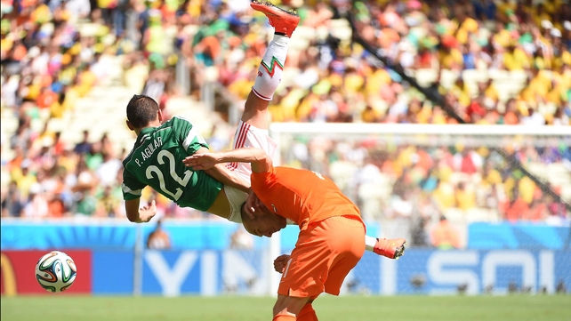 Fellow Mexico defender Hector Aguilar also kept close to Robben, refusing to 'get out of his hair' - so to speak