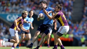 Michael Darragh Macauley and Ciaran Lyng battled hammer and tong all the match long