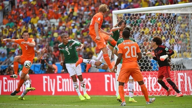 Mexico had more success when Ochoa made a remarkable save midway through the second. The strong shot came off Dutch defender Stefan de Vrij (#3)