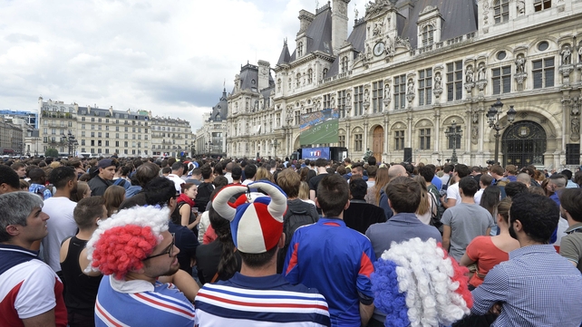 France fans in Paris continued to watch the tight action consumed in concentration