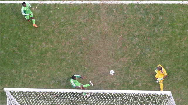 Despite Nigeria's blistering play in the first half, their side began to waver under a constant attack from France, which saw two near chances midway through the second. Here, forward Victor Moses barely kept the ball on the right side of the line