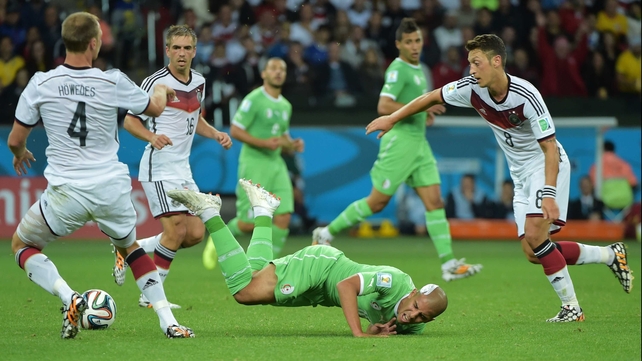 Algeria forward Sofiane Feghouli - sporting a head bandage from a knock in his previous match - continued to throw himself completely into the match