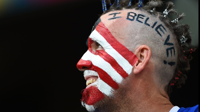 A United States fan gets behind his team