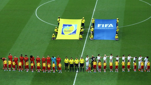 The US took up a typically patriotic stance as their anthem was played at the Arena Fonte Nova