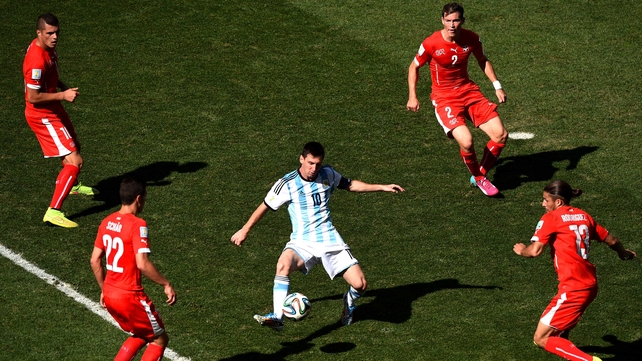 Lionel Messi of Argentina controls the ball against Josip Drmic, Fabian Schar, Stephan Lichtsteiner and Ricardo Rodriguez of Switzerland