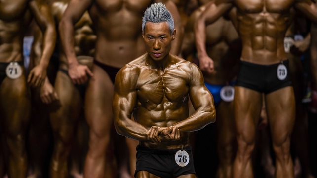 A metallic-looking competitor at the Hong Kong Bodybuilding Championships