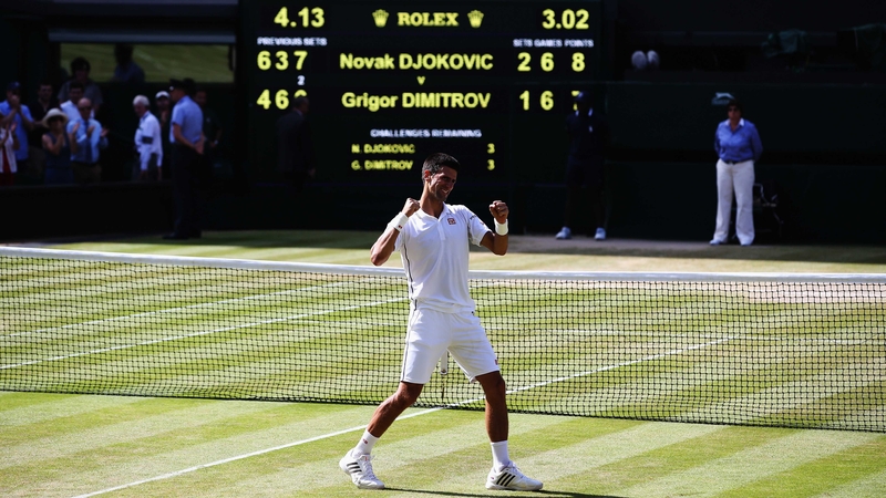 Novak Djokovic celebrates victory on Centre Court