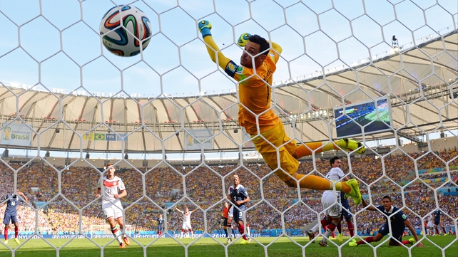 Hugo Lloris is unable to stop Mats Hummels header as Germany take an early lead