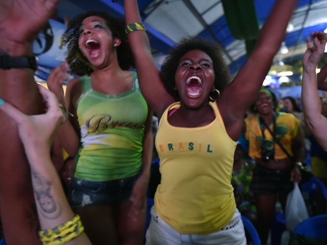 Brazilian fans in Rio celebrate victory