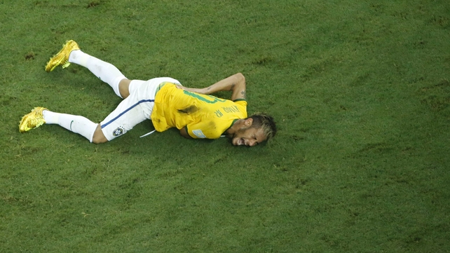 Brazil's talisman Neymar down and out of the World Cup with a fractured vertebra