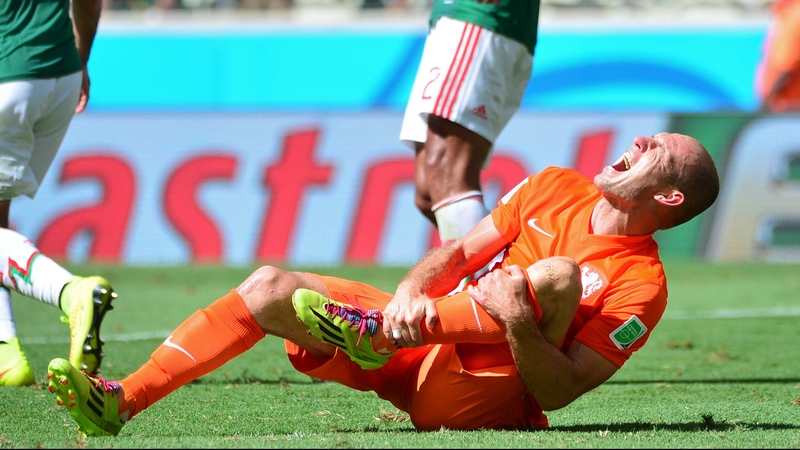 Arjen Robben reacts to a tackle during the Netherlands v Mexico game