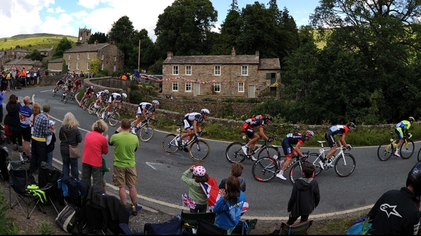 The Peloton passing through the village of Muker, Yorkshire