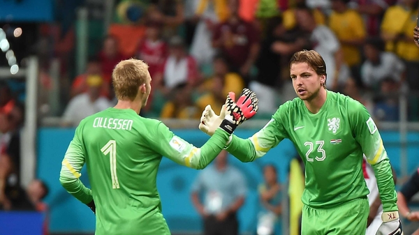 Jasper Cillessenshakes hands with Tim Krul as the remarkable substitution was made