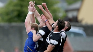 Conor McGraynor of Wicklow is crowded out by Sligo players during their qualifier
