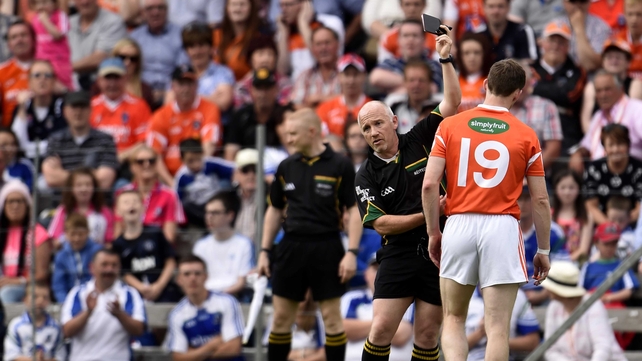 Armagh's Finnian Moriarty receives a black card late in the game in Clones