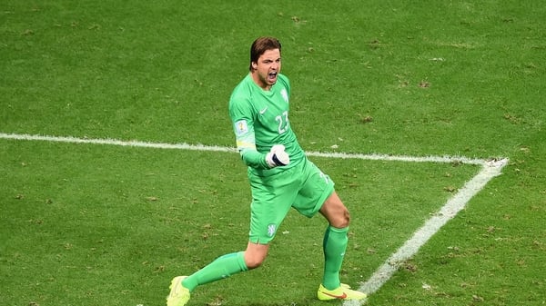 Tim Krul of the Netherlands celebrates after saving a penalty against Costa Rica