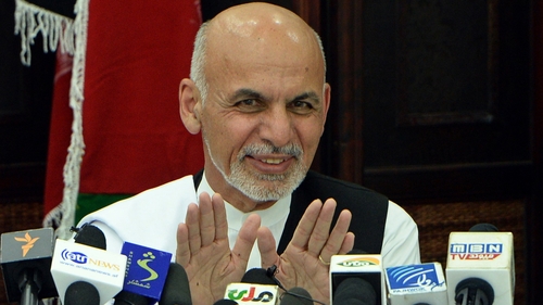 Under the terms Mr Ghani will share power with a chief executive proposed by Mr Abdullah