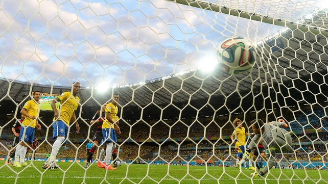 Brazil keeper Julio Cesar couldn't grab the ball, which put Germany up 1-0 at just 11'