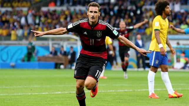 Miroslav Klose celebrates becoming the record goalscorer at World Cup finals with his 16th in four tournaments, this time against hosts Brazil