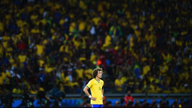 Luiz - who seemed nothing more than a ghost haunting the pitch - looked on at the scene of Brazil's greatest nightmare