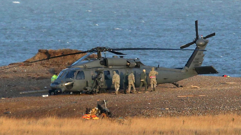 Emergency personnel at the scene of the crash in January