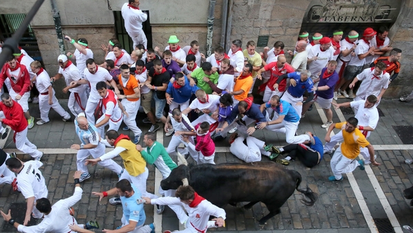A US writer was badly gored during this morning's bull run