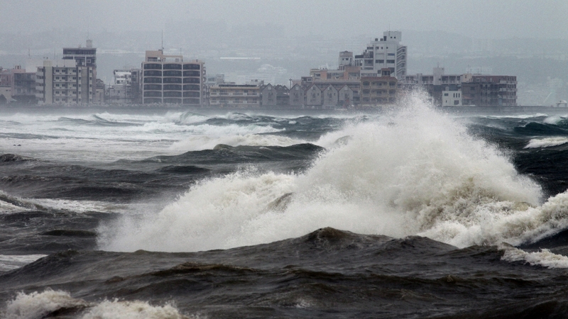 Huge waves generated by typhoon Neoguri hit Mizugama beach in Kadena, on the island of Okinawa