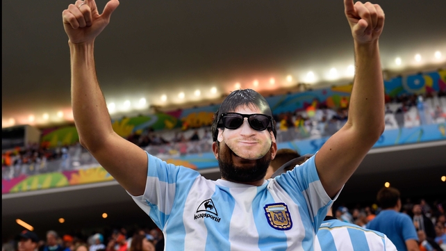 A masked supporter approved of his idol's efforts