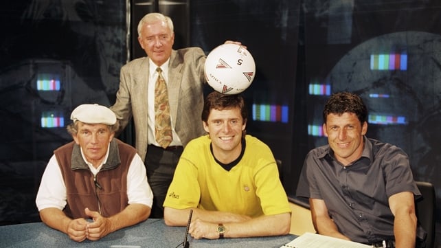And seen here placing a ball on Niall Quinn's head in the same photo shoot