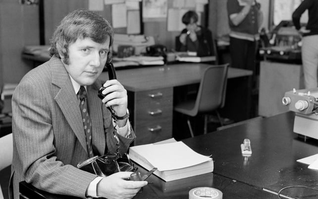Pensive pipe-smoking in 1974: Bill on the sports desk