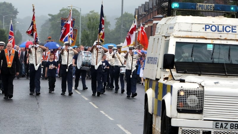 PSNI leads an Orange Order parade as it mounted a major, but low-key security operation
