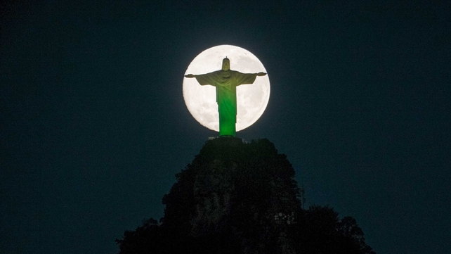 The night before the big clash, a 'super moon' shined over Rio de Janeiro, glowing down on the iconic Christ the Redeemer statue