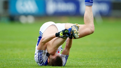 Laois's Ross Munnelly injures his ankle during the game against Tipperary