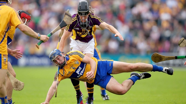 Wexford's Liam Og McGovern with Conor Ryan of Clare
