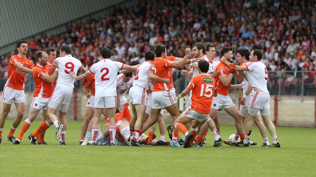 The Tyrone and Cavan players get into a scuffle during their qualifier