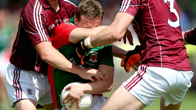 Mayo's Andy Moran under pressure from Galway players