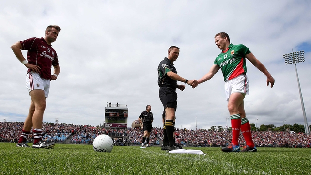 Captains Andy Moran and Paul Conroy with referee Rory Hickey for the coin toss ahead of the Connacht decider