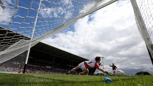 Mayo goalkeeper Robbie Hennelly saves a penalty from Shane Walsh of Galway